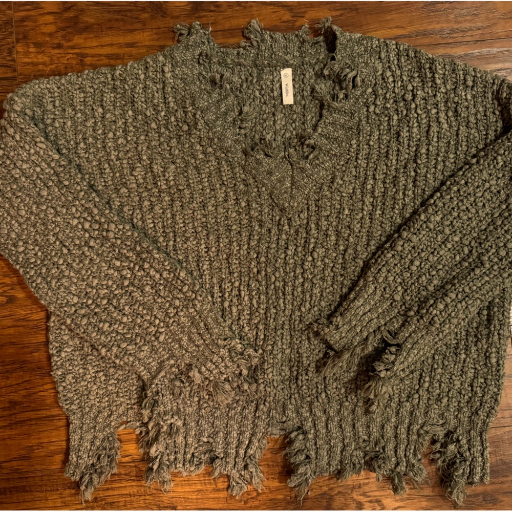 Crop Sweater with frayed hem, sleeves and neckline.